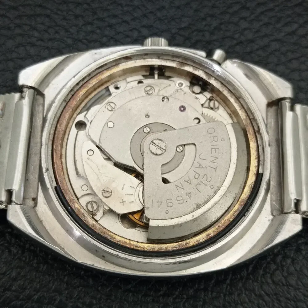 Vintage 1982 Orient Automatic Mens Silver Watch W/daydate & Gold accents